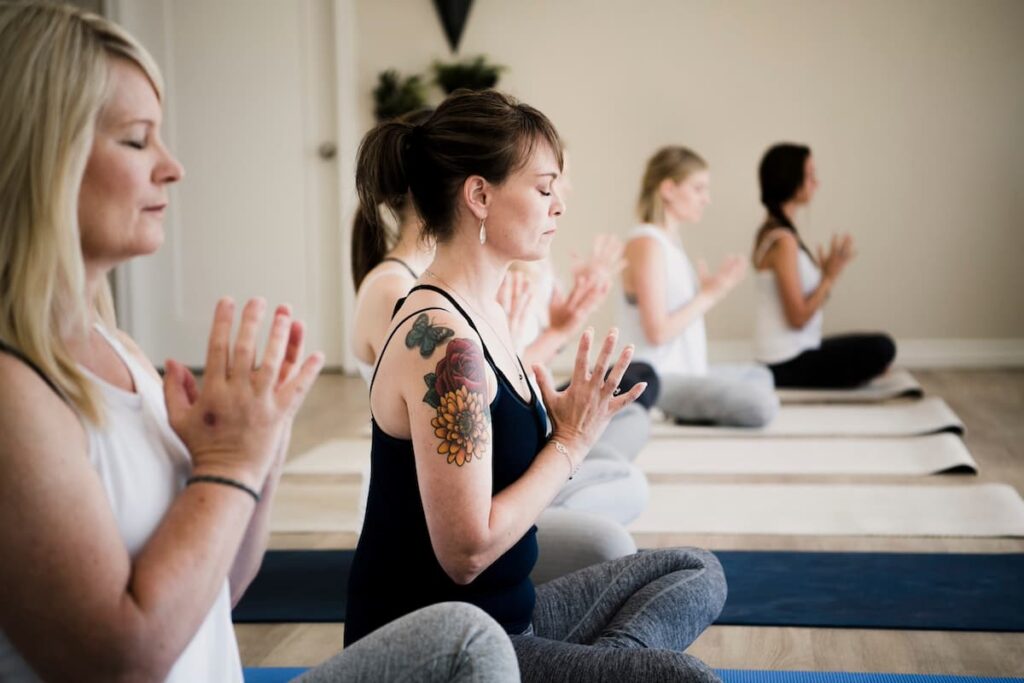 Women enjoying a private yoga session