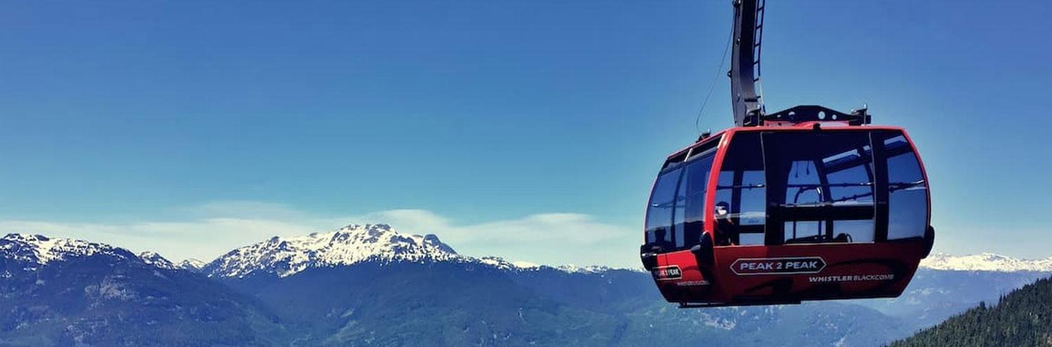 peak 2 peak gondola overlooking green mountains